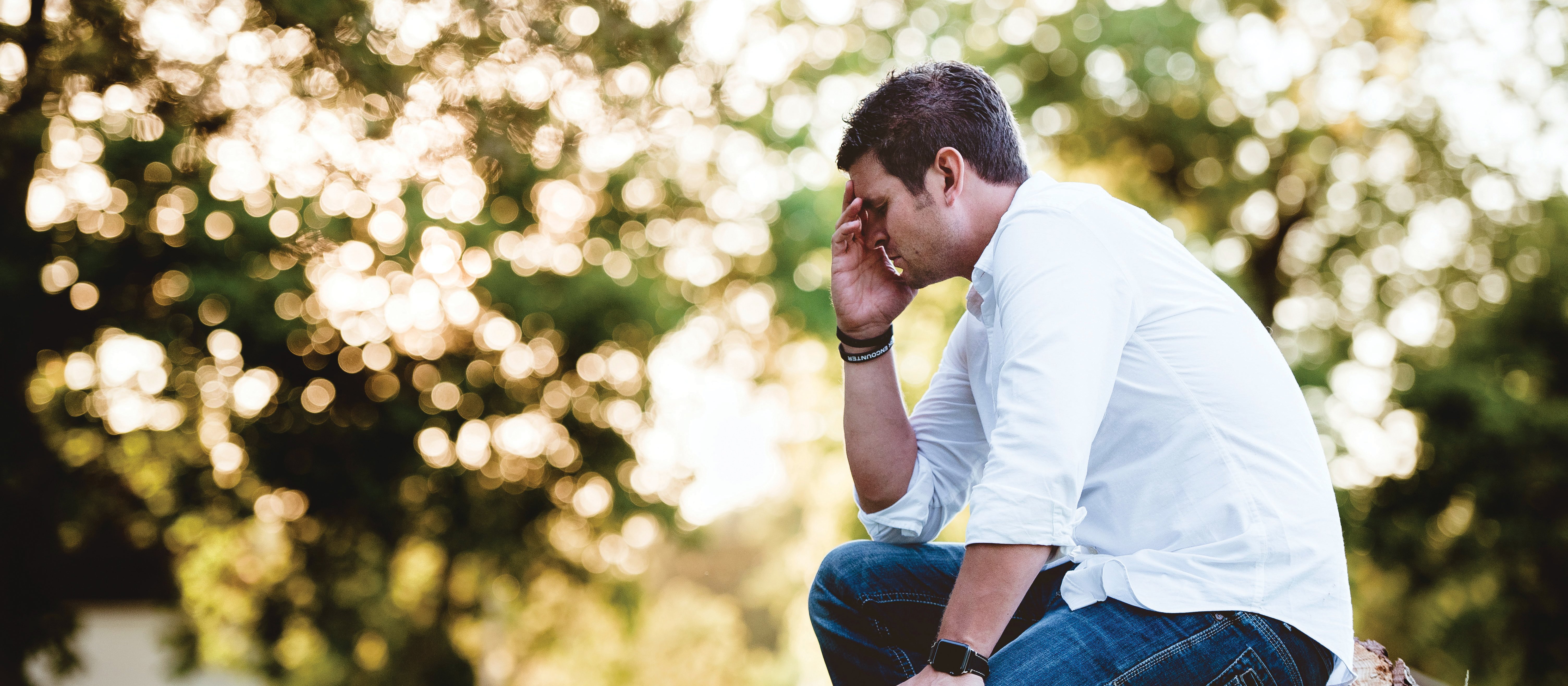 Depressed man CR Ben White on Unsplash