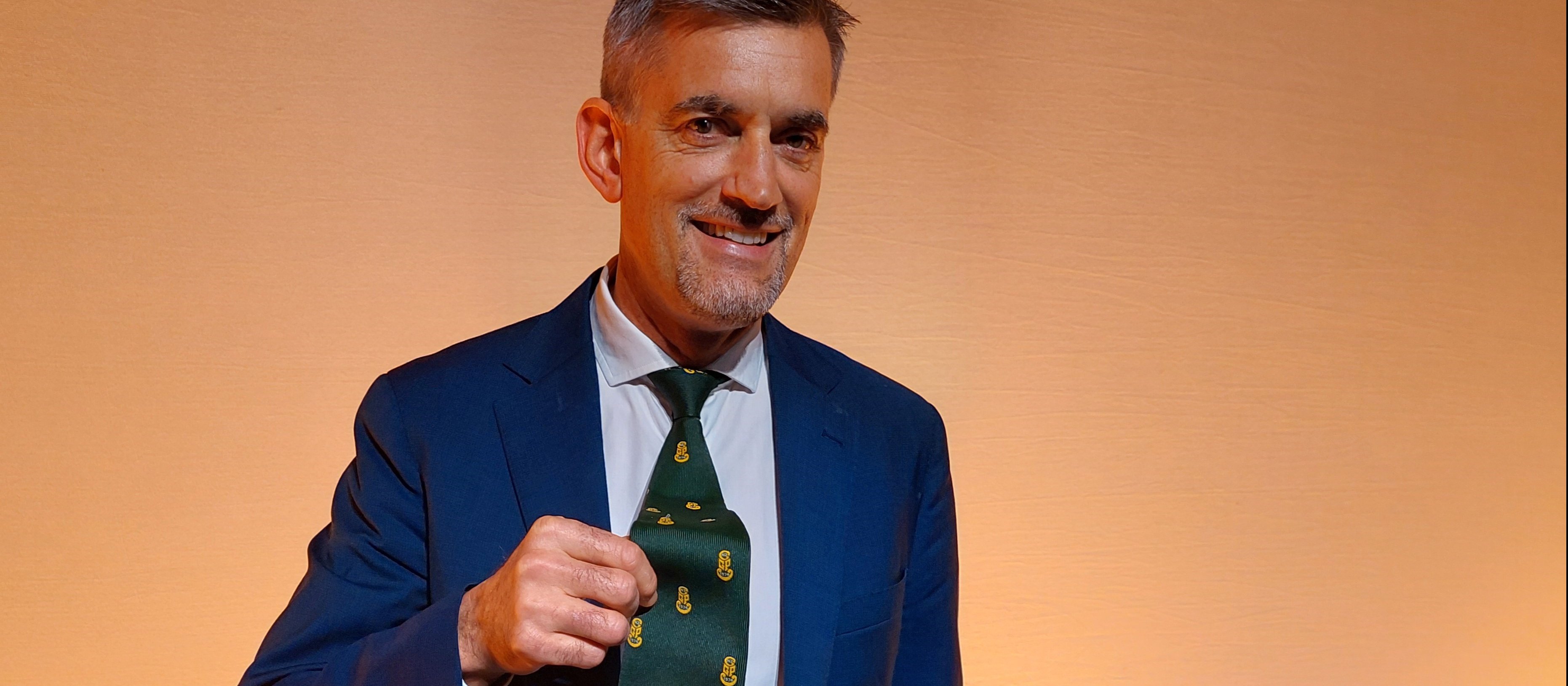 Toby Beaglehole wearing historic college tie