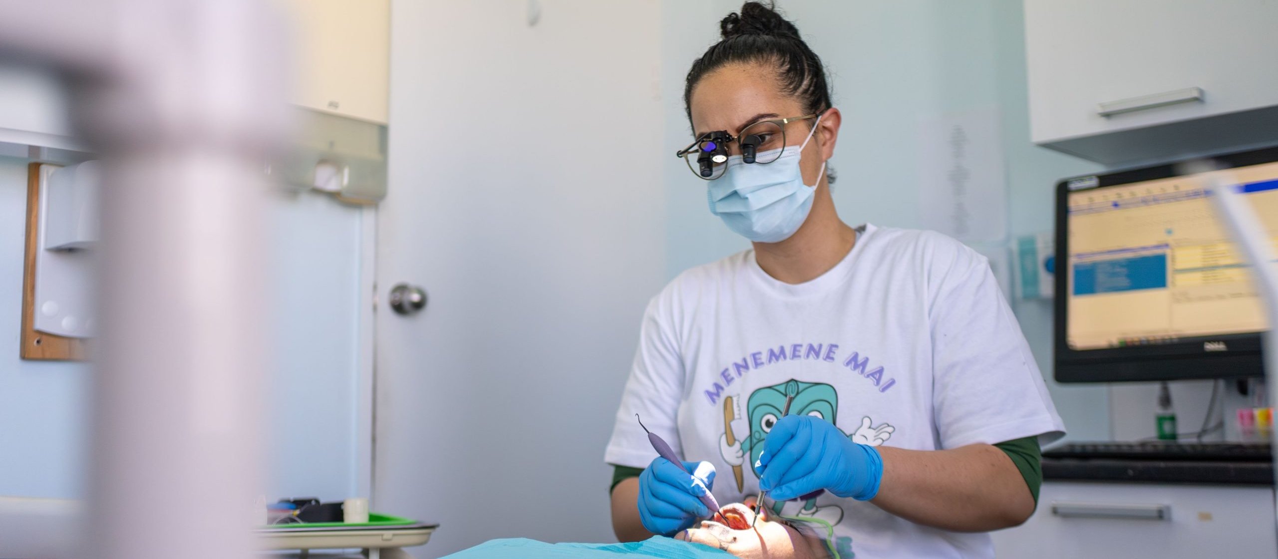 Stevie-Nyx Ruki works on a patient at Cliff Dental in Castlecliff, Whanganui