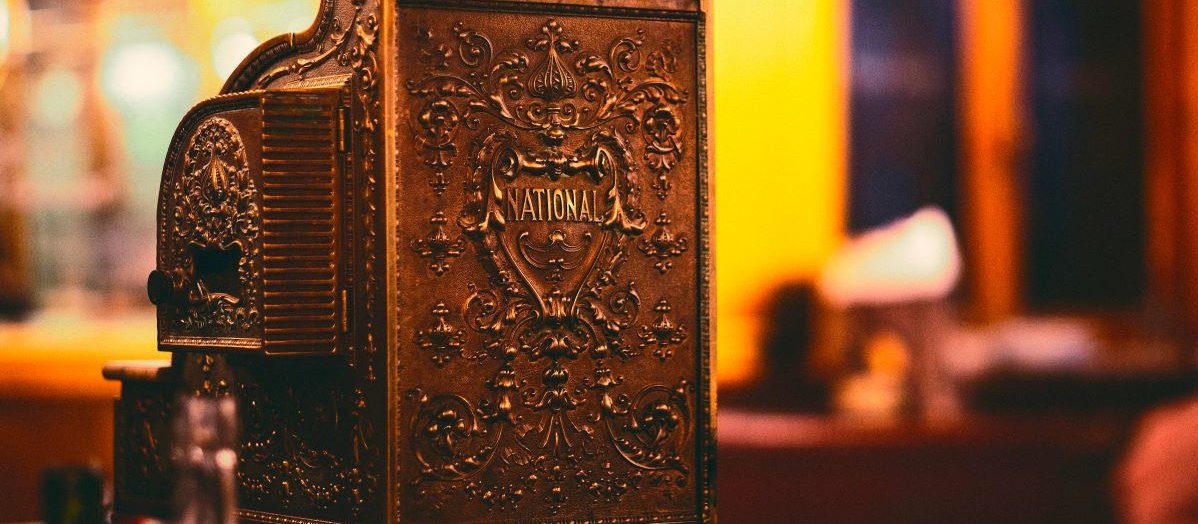 Cash Register by Age Barros, Unsplash, sepia