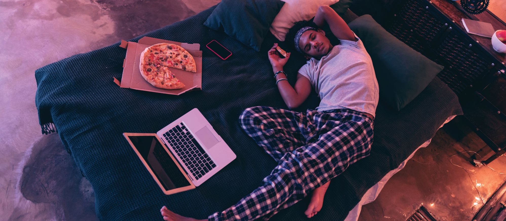 Eating on bed CR Yacobchuk on iStock
