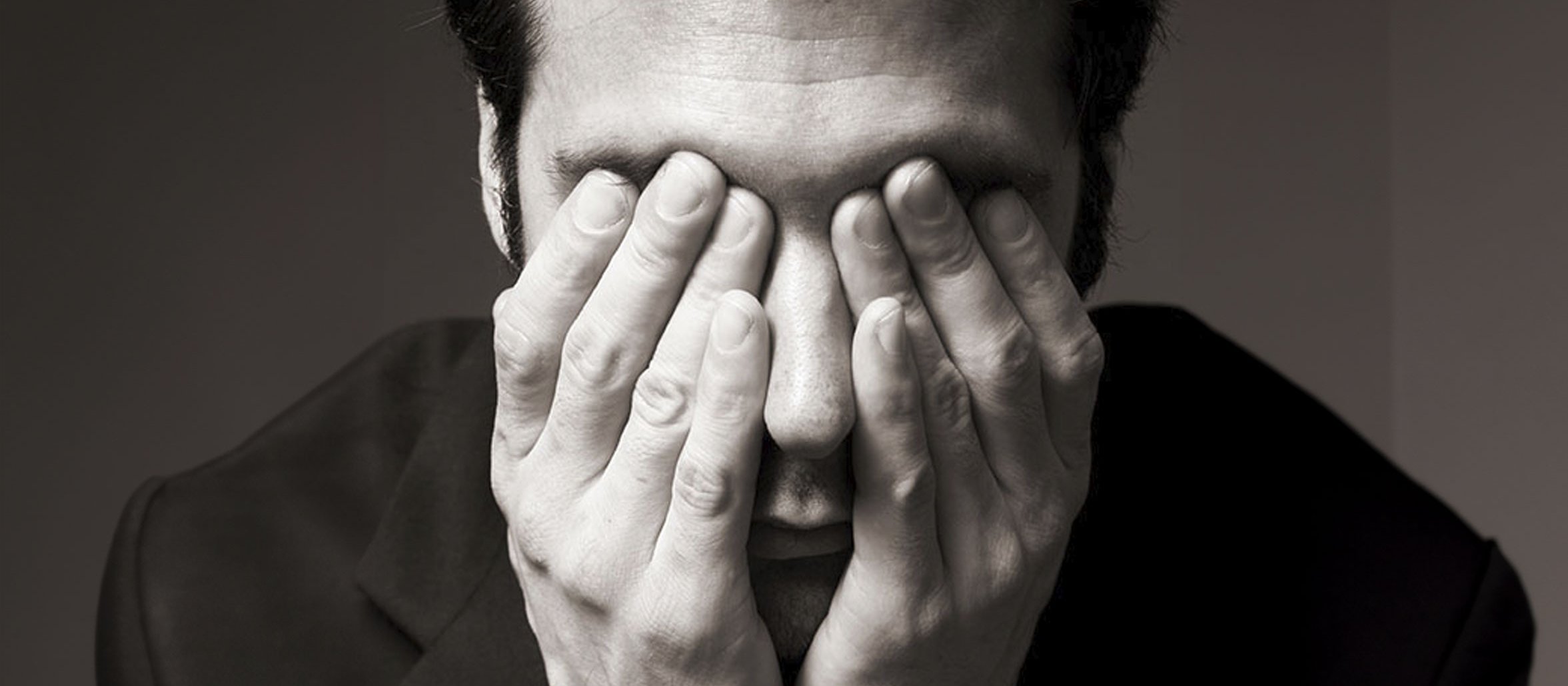 Man covering eyes CR Andipantz on iStock