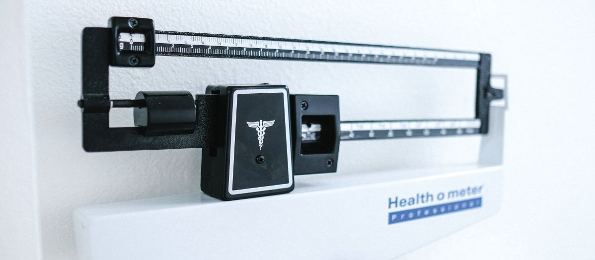 Medical scales CR Kenny Eliason on Unsplash