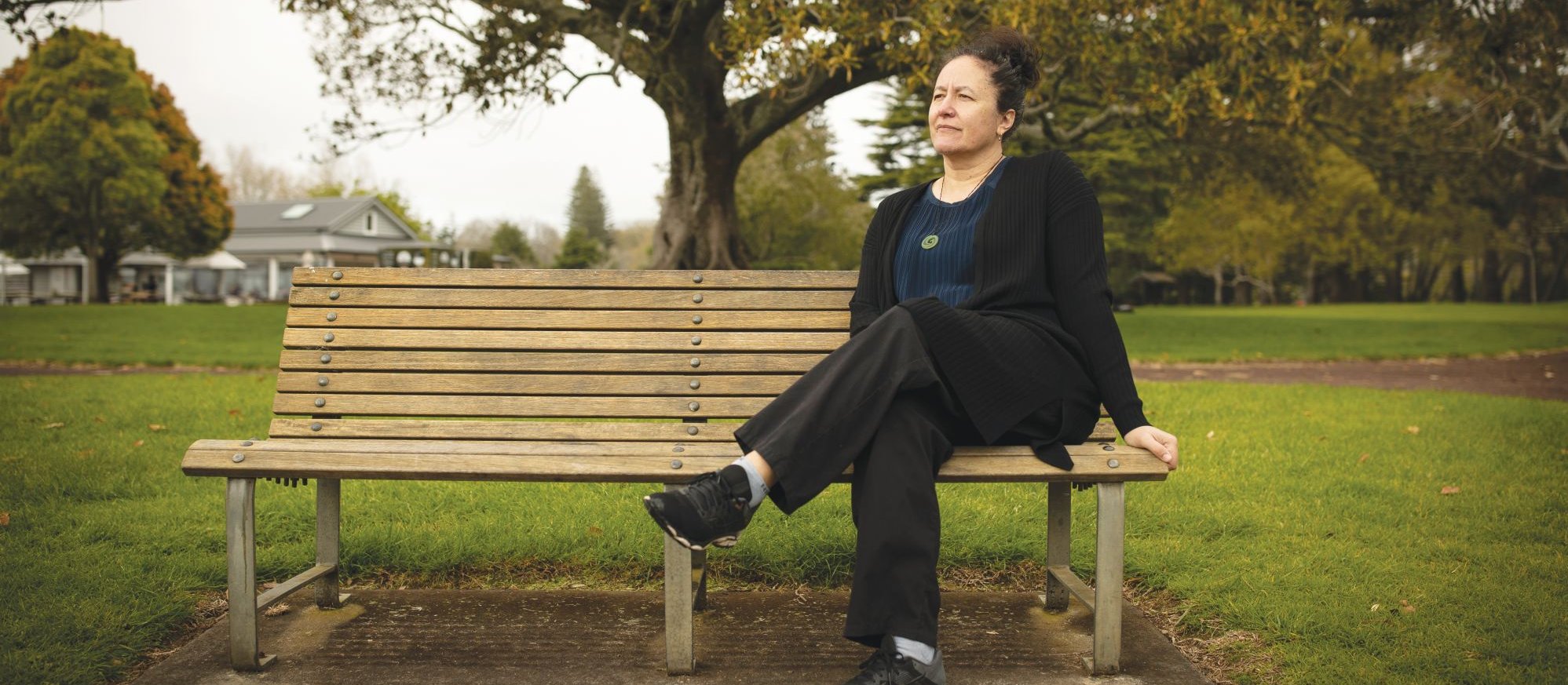 Matire Harwood sitting on a park bench