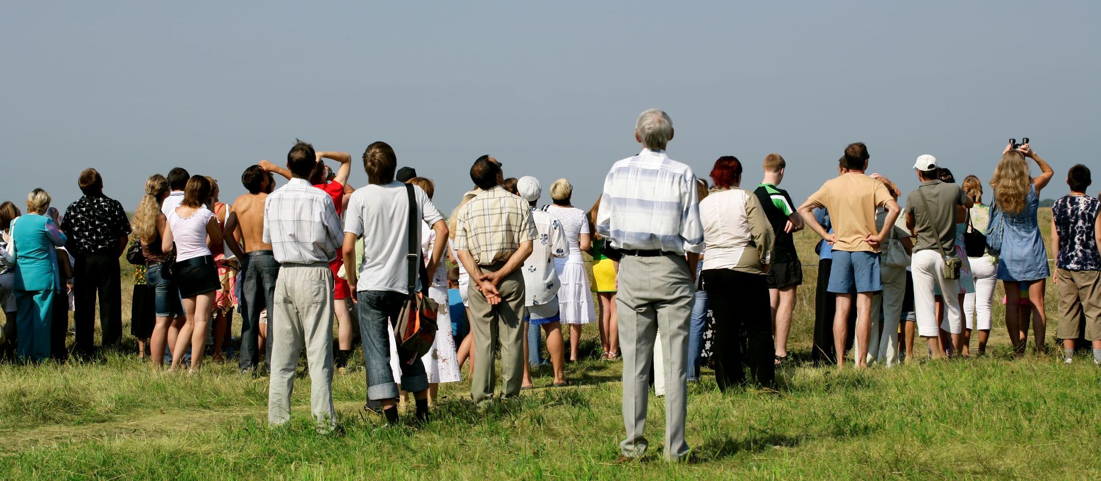 People watch the sky
