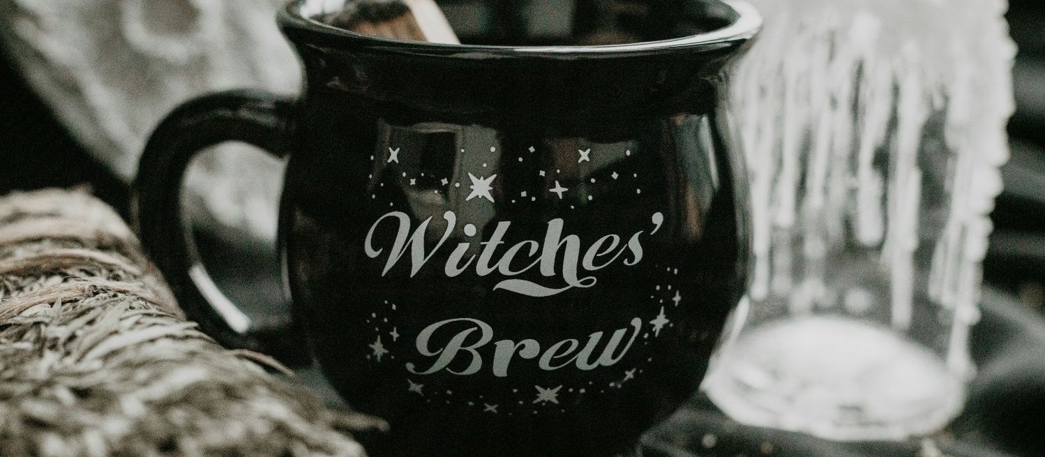 Black mug on table CR Ksenia Yakovleva on Unsplash