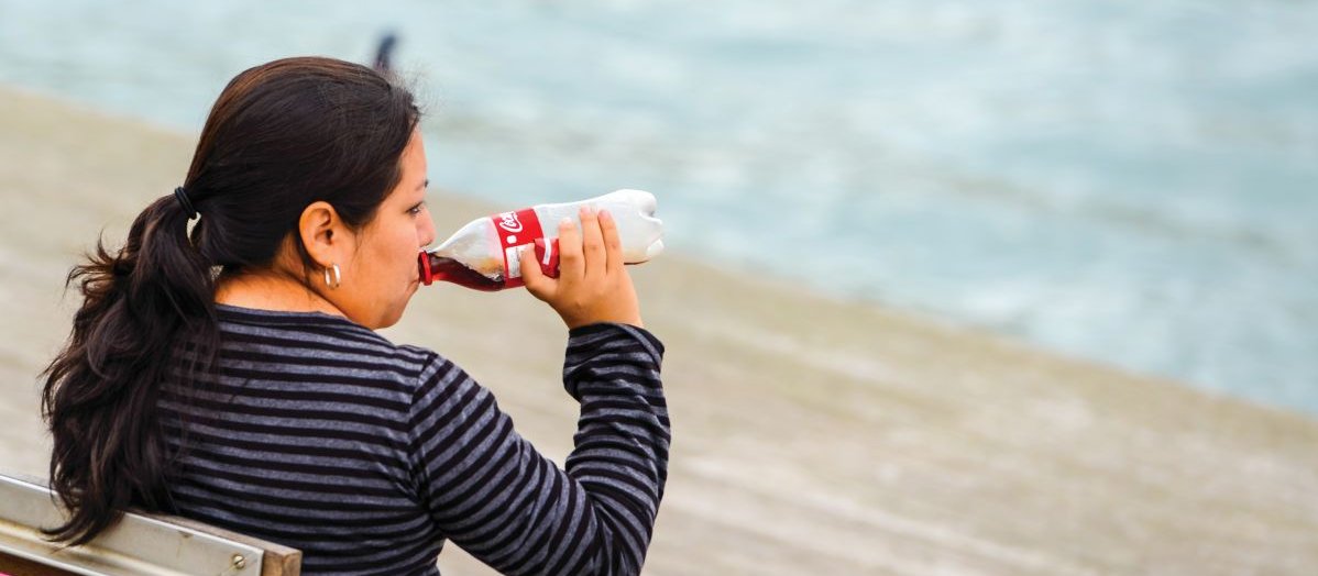 Woman drinking coke