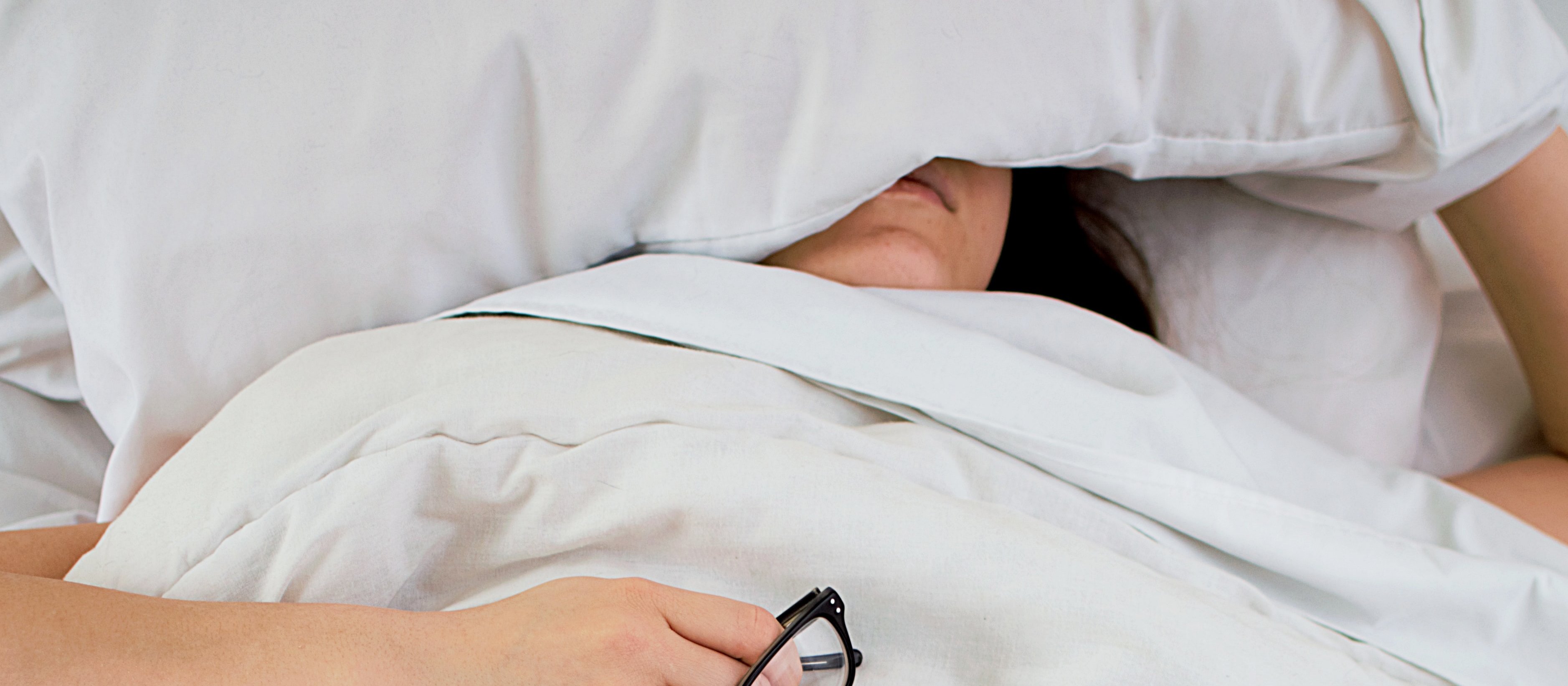 Sick and tired in bed Isabella and Louisa Fischer on Unsplash