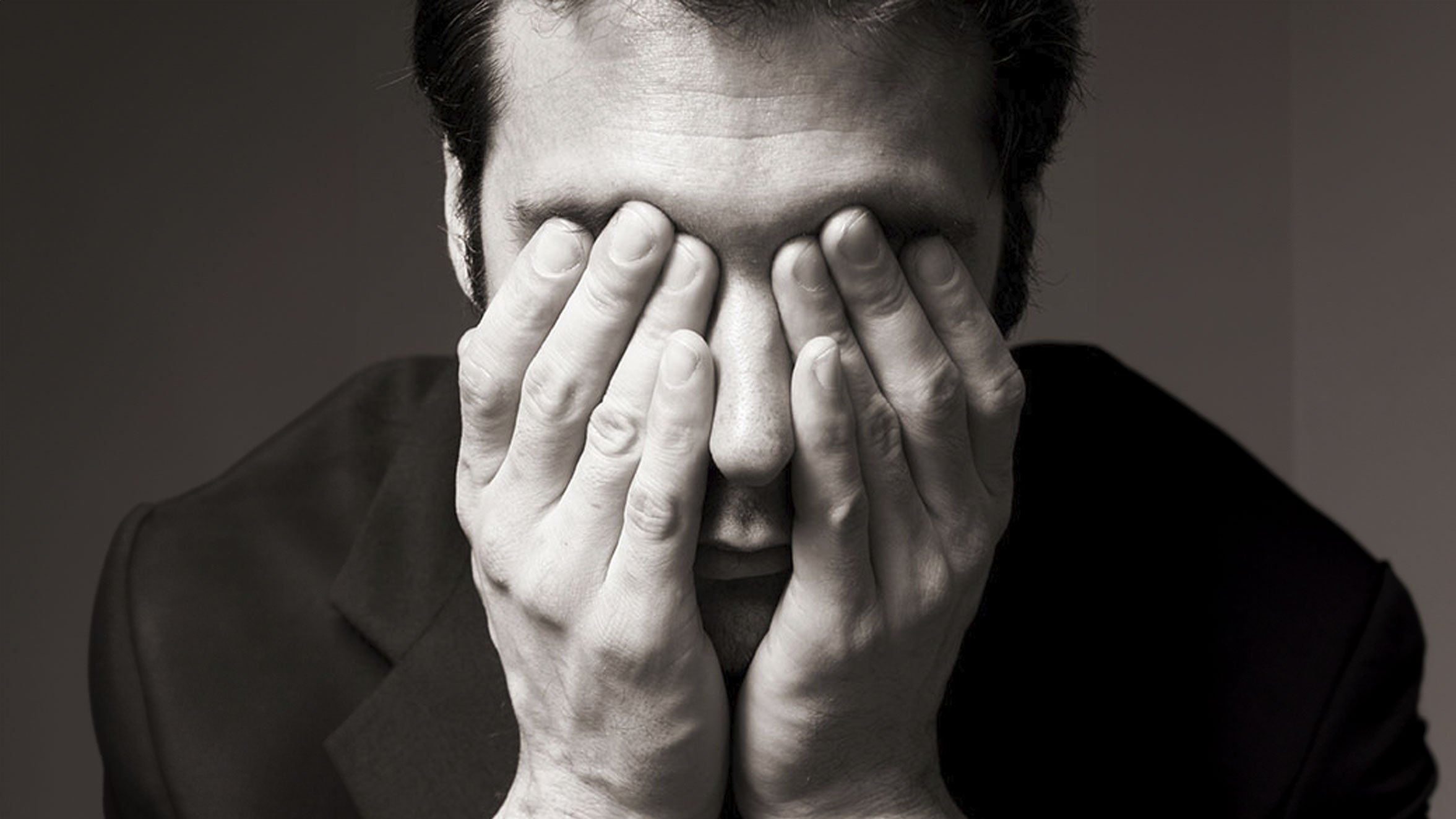 Man covering eyes CR Andipantz on iStock