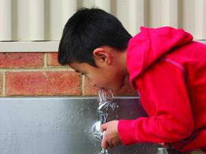 Boy drinking water
