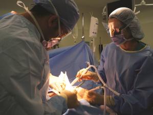 Surgeons operating