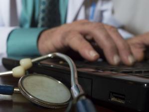 GP computer, stethoscope