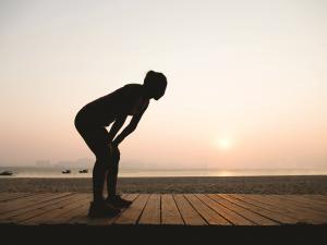 Woman runner rests