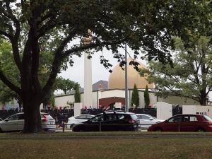 Masjid Al Noor Mosque in Christchurch after the terror attacks, with flowers placed along the top of the fence [photo: James Dann, 17 March 2019]