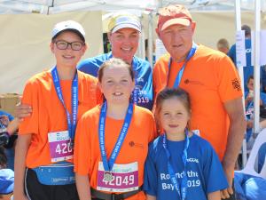Stephanie Taylor of St Heliers Bay Medical Centre with her three daughters and her father