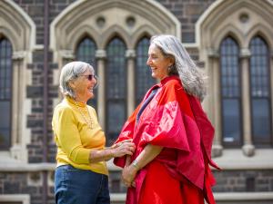 Edith Atmore (left) with daughter Dr Carol Atmore wearing great-grandmother's gown for PhD graduation 2019