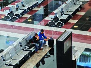 Men waiting at the airport