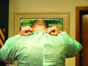 Gowning up, PPE, gown, COVID-19