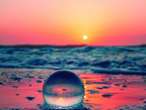 Crystal ball, setting sun