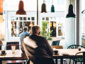 Retired GP in a cafe