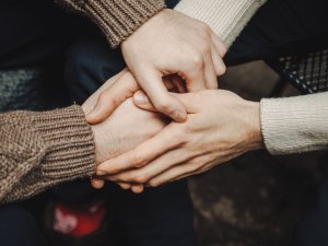  Supportive hand holding_Renate Vanaga on Unsplash