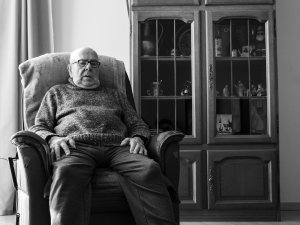 old man in chair CR Ulrich Derboven on Unsplash.jpeg