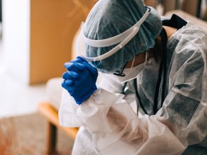 fatigued Nurse CR Nikkimeel on iStock