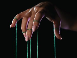 Puppett Strings Hand CR Sergey Kirsanov on iStock