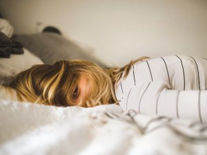Teenage girl on bed