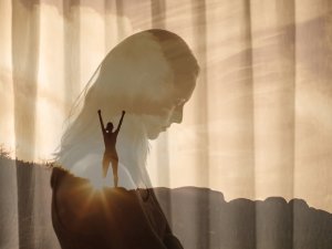 Woman reflective CR Kieferpix on iStock