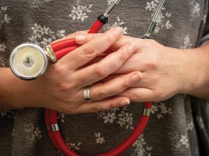 Stethoscope and hands