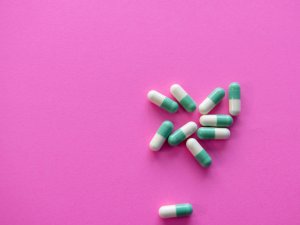 Pills on a pink background