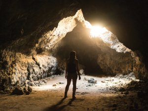 Woman in a cave