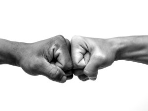 Fist bump CR Worawut Prasuwan on iStock 