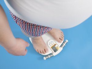 Overweight man on scales
