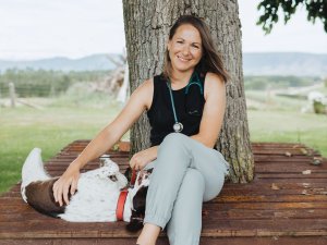 Debra Wilson with dog and tree CR Supplied