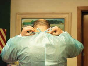 Gowning up, PPE, gown, COVID-19
