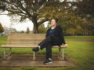 Matire Harwood sitting on a park bench