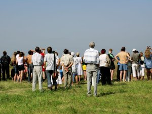 People watch the sky
