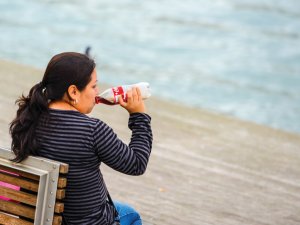 Woman drinking coke
