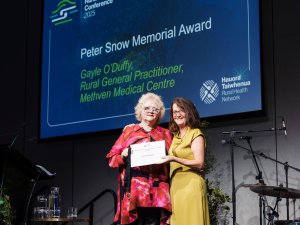 Gayle O'Duffy and Fiona Bolden presenting the Peter Snow Award 2025