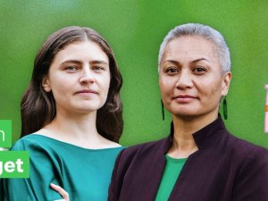 Image shows Green Party co-leaders Chloe Swarbrick and Marama Davidson on a green background and images from the party's Budget document