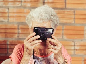 Old Person taking photo