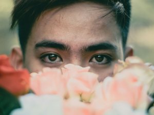 Man, eyes, flowers