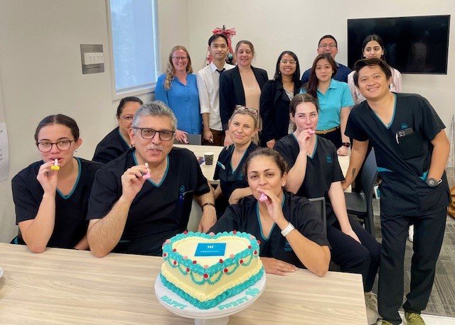 The Waitemata Endoscopy team celebrate with cake