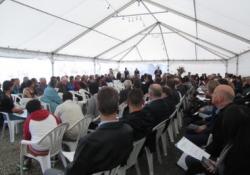 Health sector representatives and community and iwi members gather in the marquee to celebrate the opening of the hospital extension