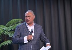 Conference emcee Adrian Te Patu welcomes attendees to the conference 